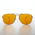 Load image into Gallery viewer, Sunglasses with yellow lenses on a white background
