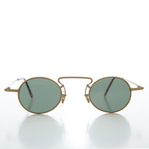 oval gold sunglasses