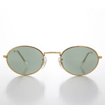 Load image into Gallery viewer, oval gold frame
