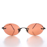 Load image into Gallery viewer, 90s Rimless Oval Copper Lens Sunglass
