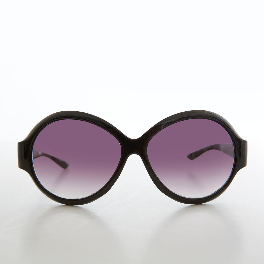 round oversized black women's sunglasses with gradient lenses