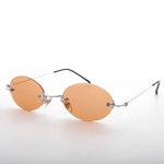 Load image into Gallery viewer, orange rimless colored lens vintage sunglass

